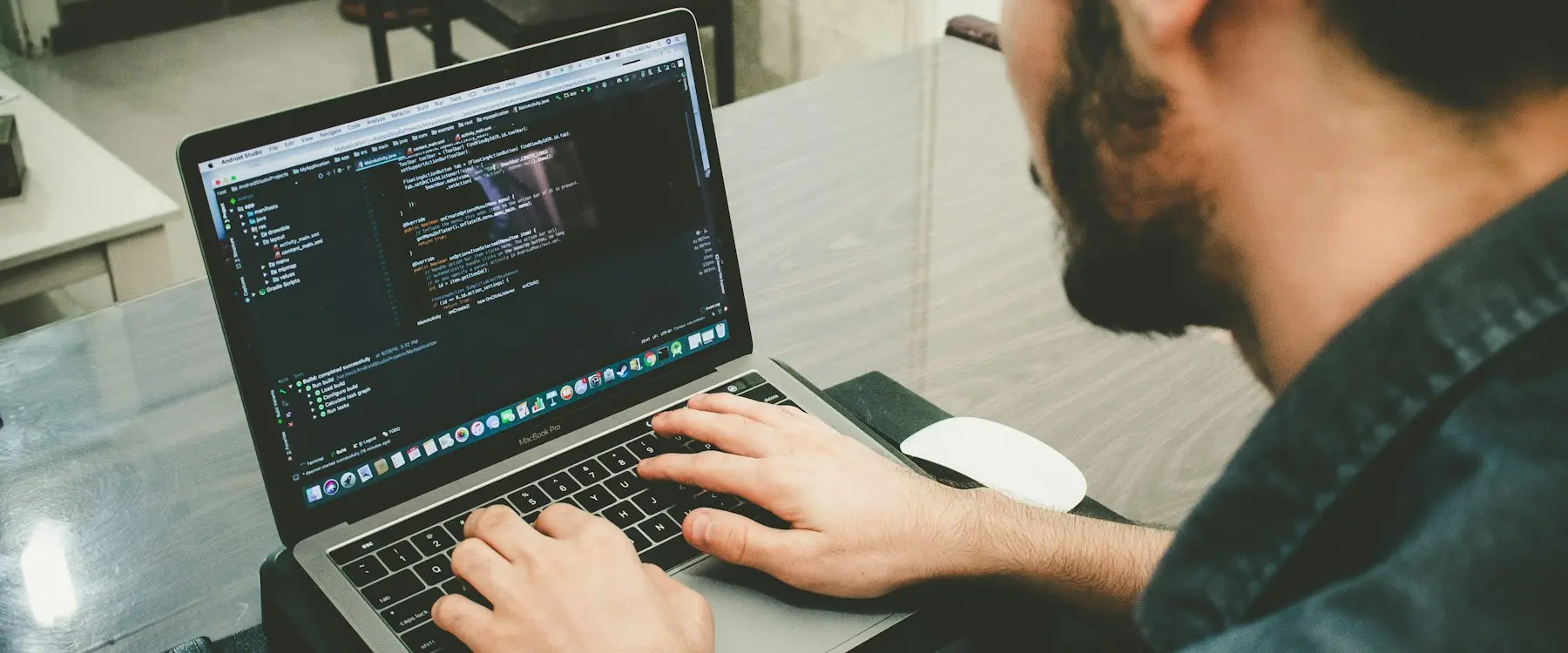 A developer working on a laptop